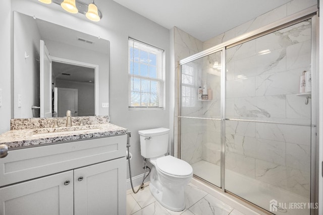 767 Coolidge Ave, Woodbridge Proper, NJ 07095 - full bathroom featuring marble finish floors, toilet, vanity, a marble finish shower, and baseboards