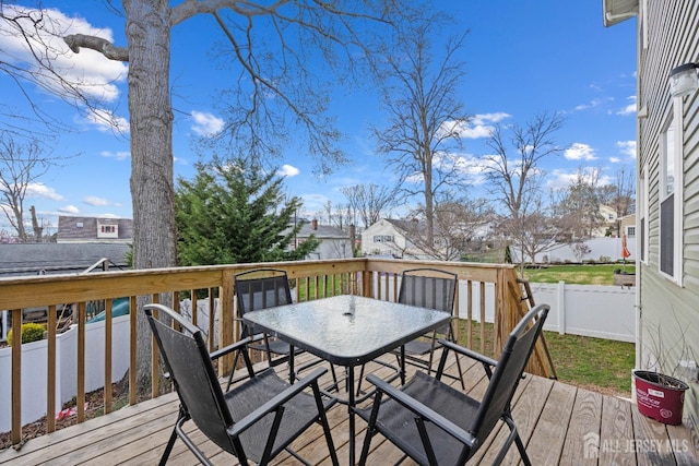 767 Coolidge Ave, Woodbridge Proper, NJ 07095 - deck with outdoor dining space and a fenced backyard