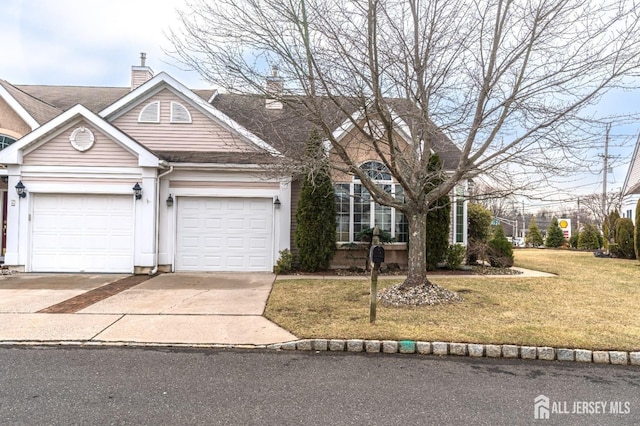 47 Birmingham Ln, Monroe, NJ 08831 - traditional-style house with driveway, a front yard, a chimney, a garage, and a shingled roof