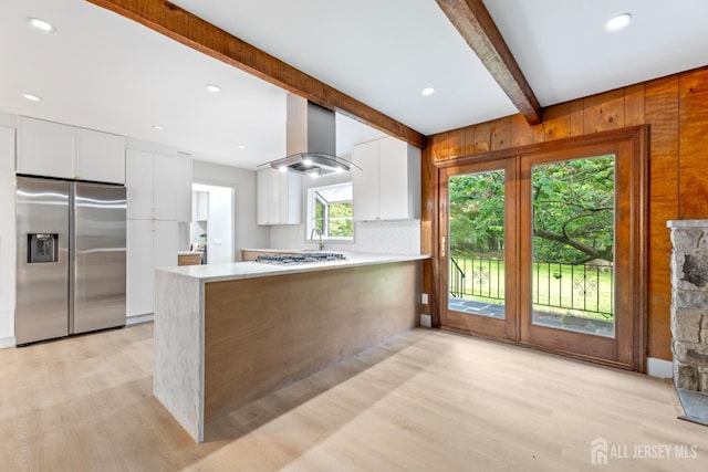 4 Hickory Trl, Flemington, NJ 08822 - kitchen with stainless steel fridge, light wood-type flooring, white cabinetry, beamed ceiling, and light countertops