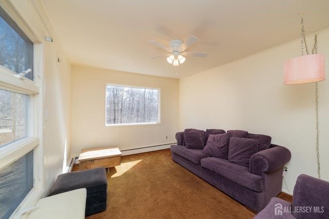 carpeted living room with a baseboard radiator and a ceiling fan