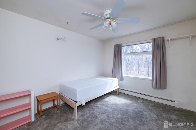 bedroom featuring a baseboard radiator, ceiling fan, and carpet flooring