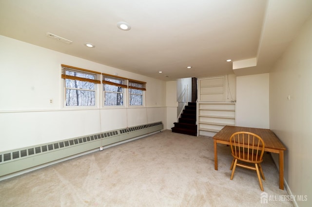 living area with visible vents, stairs, baseboard heating, recessed lighting, and carpet
