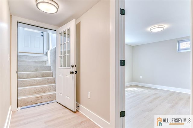 32 Campbell Ave, Edison, NJ 08817 - entryway featuring light wood-style flooring, stairway, and baseboards