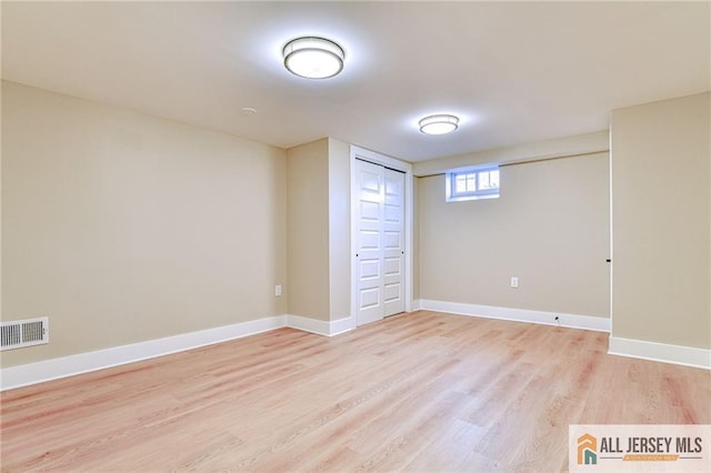 32 Campbell Ave, Edison, NJ 08817 - basement with light wood-style floors and baseboards