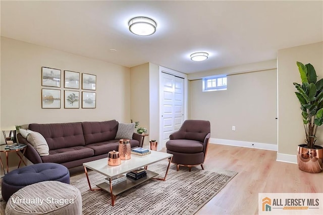 32 Campbell Ave, Edison, NJ 08817 - living room with light wood-type flooring and baseboards