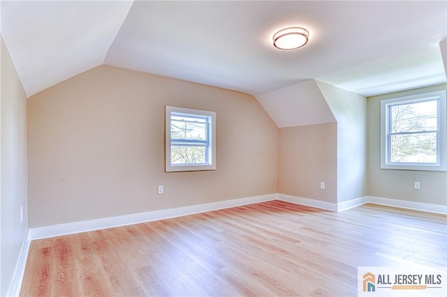 32 Campbell Ave, Edison, NJ 08817 - bonus room with plenty of natural light, vaulted ceiling, light wood-style flooring, and baseboards