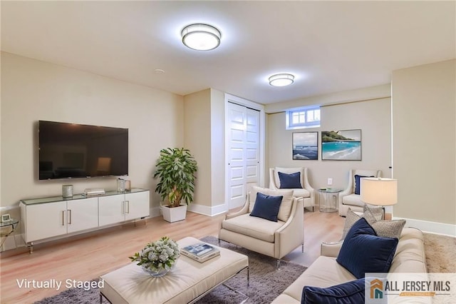 32 Campbell Ave, Edison, NJ 08817 - living room with light wood-style floors and baseboards