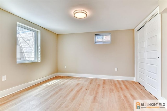 32 Campbell Ave, Edison, NJ 08817 - unfurnished bedroom featuring light wood-type flooring, baseboards, and a closet