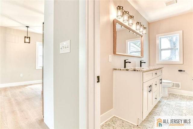 32 Campbell Ave, Edison, NJ 08817 - full bath featuring toilet, baseboards, and double vanity