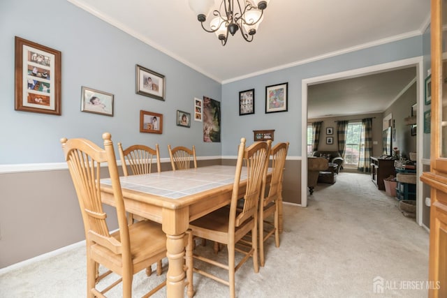 3 Pond View Dr, Plainsboro, NJ 08536 - dining space featuring a chandelier, light colored carpet, ornamental molding, and baseboards