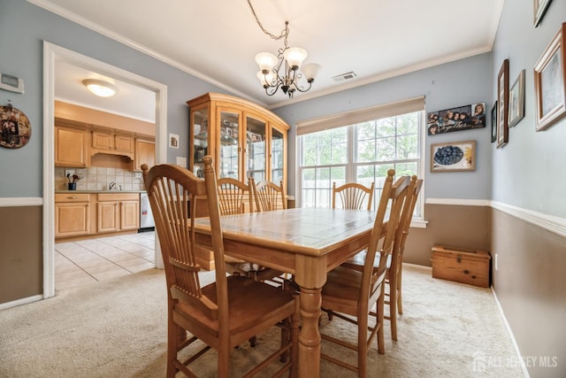 3 Pond View Dr, Plainsboro, NJ 08536 - dining area featuring a chandelier, light colored carpet, crown molding, and baseboards