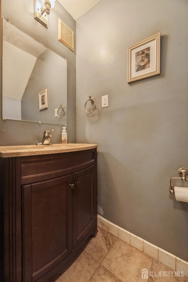 3 Pond View Dr, Plainsboro, NJ 08536 - bathroom with lofted ceiling, vanity, baseboards, and tile patterned flooring