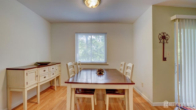 2413 Old Stone Mill Dr, East Windsor, NJ 08512 - dining room featuring light wood-type flooring and baseboards