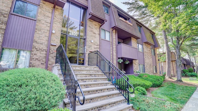 2413 Old Stone Mill Dr, East Windsor, NJ 08512 - view of building exterior featuring stairs