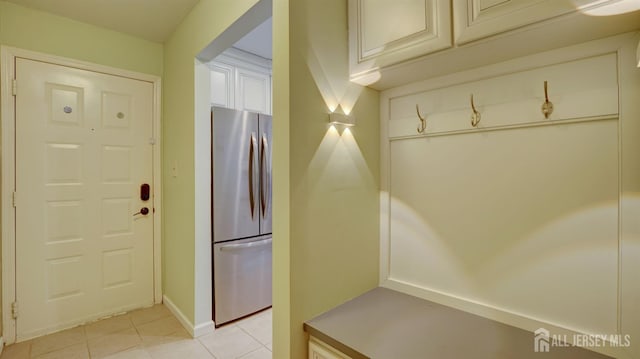 2413 Old Stone Mill Dr, East Windsor, NJ 08512 - mudroom featuring light tile patterned floors and baseboards