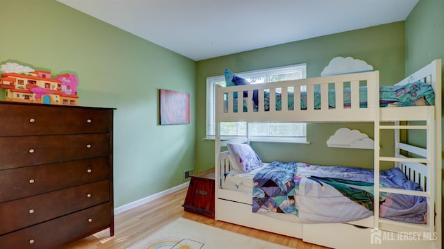 2413 Old Stone Mill Dr, East Windsor, NJ 08512 - bedroom with wood finished floors and baseboards