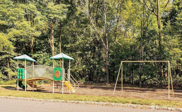 2413 Old Stone Mill Dr, East Windsor, NJ 08512 - community jungle gym with a wooded view