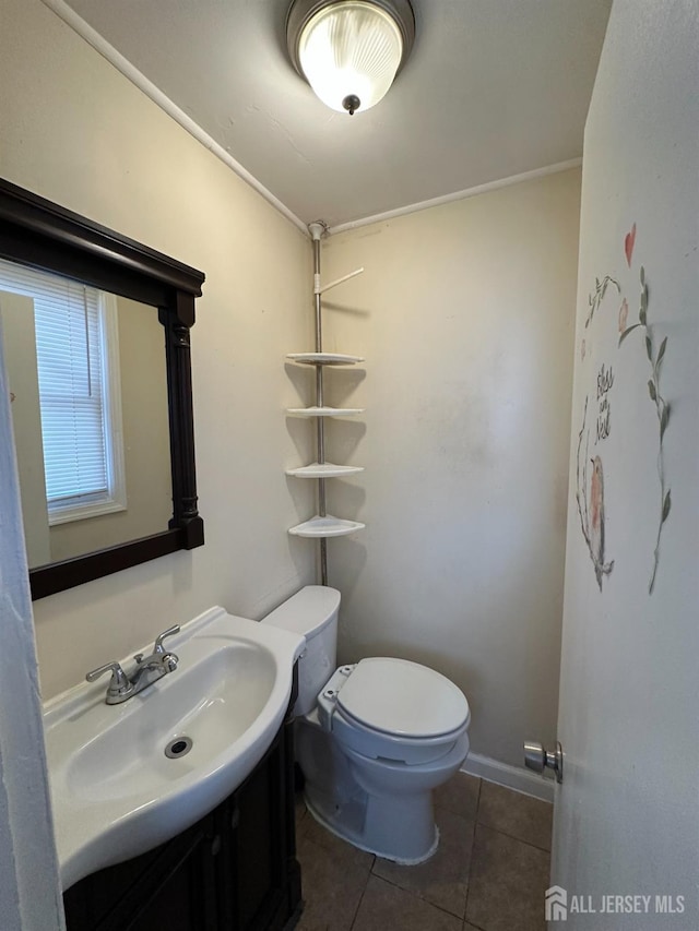 111 Joyce Kilmer Ave, New Brunswick, NJ 08901 - half bath featuring tile patterned flooring, toilet, and vanity