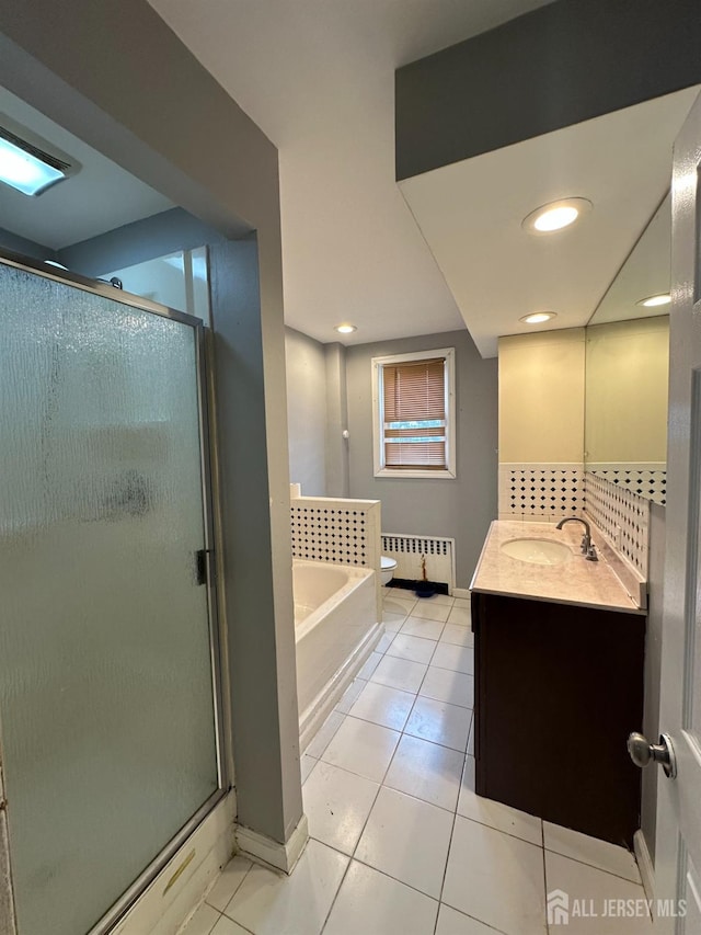 111 Joyce Kilmer Ave, New Brunswick, NJ 08901 - full bath with radiator, a stall shower, vanity, tile patterned flooring, and recessed lighting