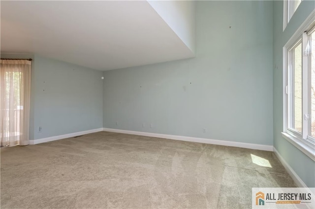 130 Sayre Dr, Plainsboro, NJ 08540 - carpeted spare room with baseboards