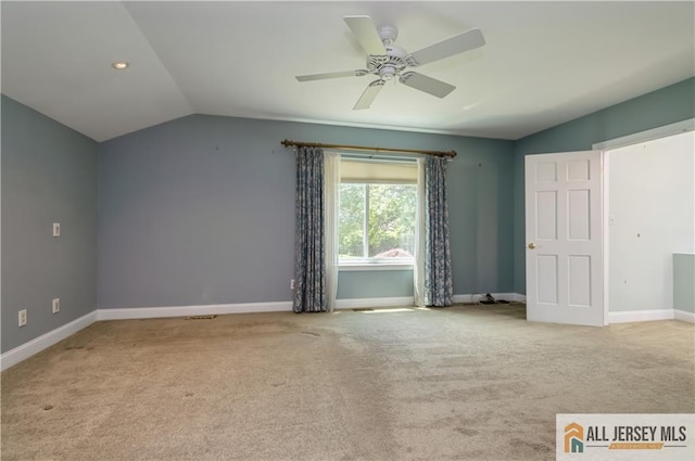 130 Sayre Dr, Plainsboro, NJ 08540 - unfurnished bedroom featuring carpet floors, lofted ceiling, baseboards, and a ceiling fan