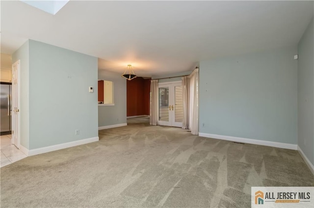 130 Sayre Dr, Plainsboro, NJ 08540 - spare room featuring light carpet and baseboards
