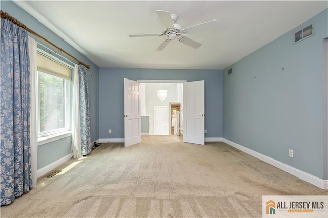 130 Sayre Dr, Plainsboro, NJ 08540 - unfurnished bedroom featuring carpet floors, baseboards, and ceiling fan
