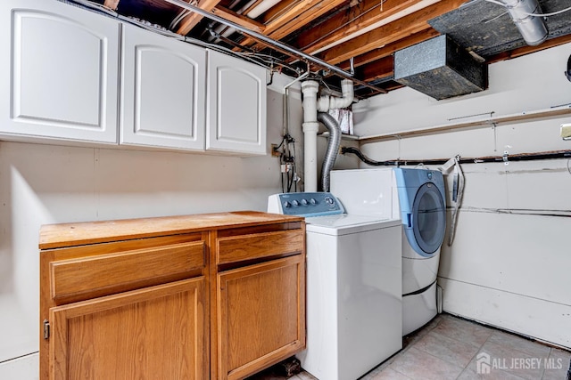 30 Daniel Dr, Matawan, NJ 07747 - laundry area featuring cabinet space, independent washer and dryer, and light tile patterned floors