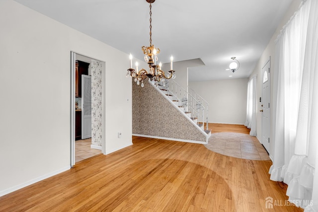 30 Daniel Dr, Matawan, NJ 07747 - entrance foyer featuring a chandelier, stairs, and light wood finished floors