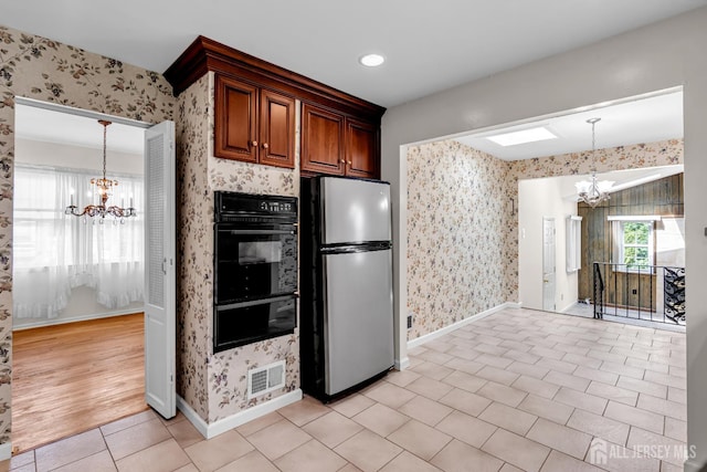 30 Daniel Dr, Matawan, NJ 07747 - kitchen featuring freestanding refrigerator, oven, a chandelier, a warming drawer, and wallpapered walls