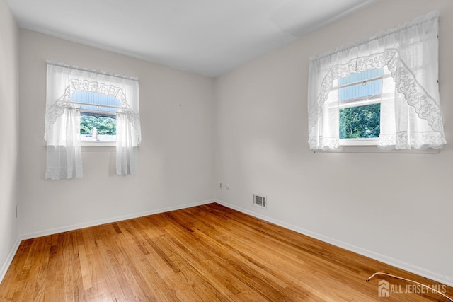 30 Daniel Dr, Matawan, NJ 07747 - unfurnished room with light wood finished floors and baseboards