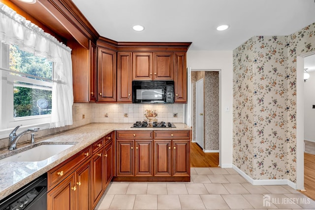 30 Daniel Dr, Matawan, NJ 07747 - kitchen with black appliances, light stone countertops, tasteful backsplash, brown cabinets, and recessed lighting
