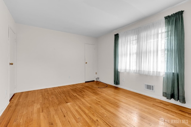 30 Daniel Dr, Matawan, NJ 07747 - empty room with light wood-style floors and baseboards