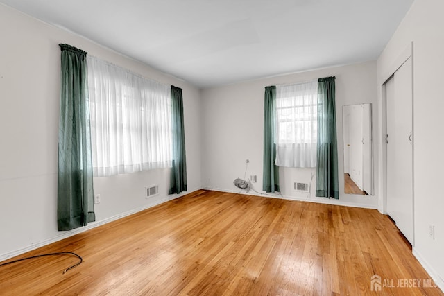 30 Daniel Dr, Matawan, NJ 07747 - empty room featuring wood-type flooring and baseboards