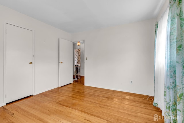 30 Daniel Dr, Matawan, NJ 07747 - unfurnished bedroom with light wood finished floors
