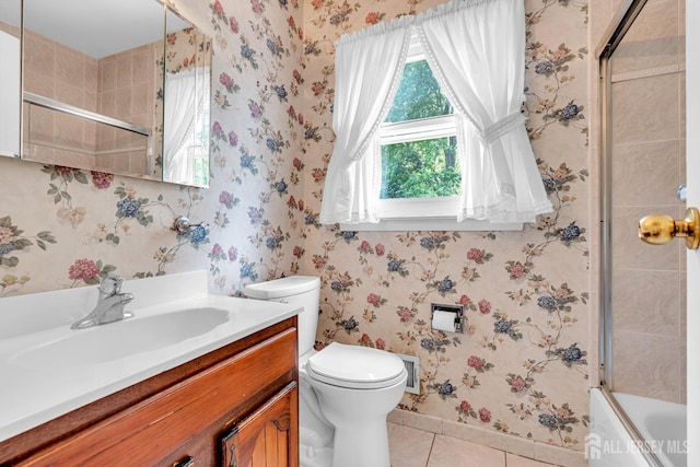 30 Daniel Dr, Matawan, NJ 07747 - full bath featuring tile patterned floors, vanity, wallpapered walls, and shower / bath combination with glass door