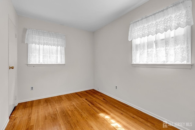 30 Daniel Dr, Matawan, NJ 07747 - unfurnished room featuring healthy amount of natural light and wood finished floors