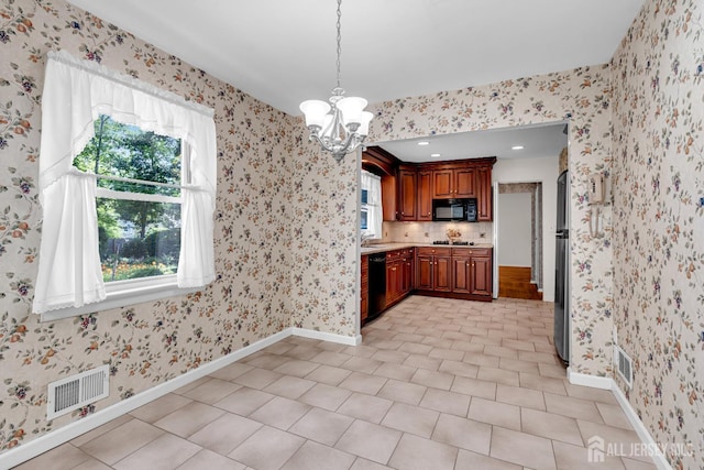 30 Daniel Dr, Matawan, NJ 07747 - kitchen featuring black appliances, a chandelier, light countertops, decorative light fixtures, and wallpapered walls