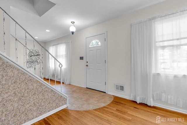 30 Daniel Dr, Matawan, NJ 07747 - entryway featuring light wood-style floors, stairs, and recessed lighting