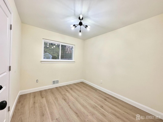 4 Joseph Ct, Old Bridge, NJ 08879 - empty room with light wood finished floors and baseboards