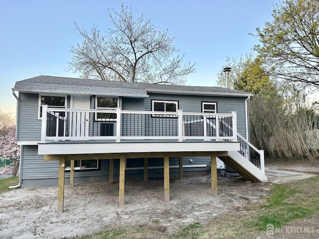4 Joseph Ct, Old Bridge, NJ 08879 - rear view of property featuring a deck, stairs, and roof with shingles