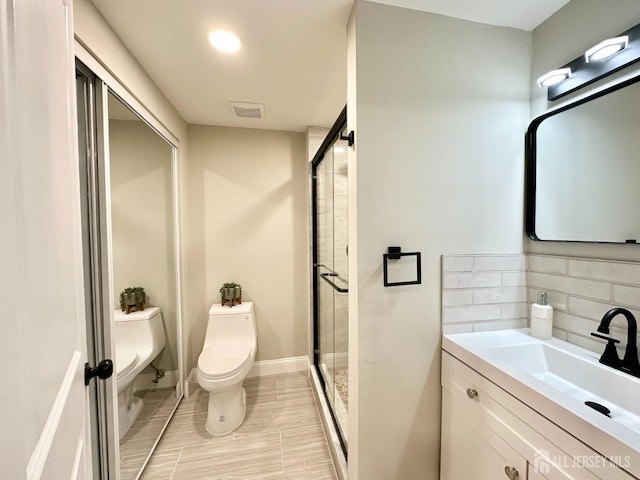 4 Joseph Ct, Old Bridge, NJ 08879 - bathroom with toilet, a shower stall, backsplash, and vanity