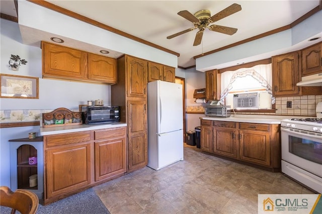 kitchen featuring tasteful backsplash, white appliances, cooling unit, crown molding, and ceiling fan