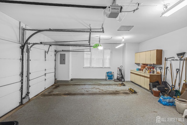 5 Fairway Blvd Unit 5, Monroe, NJ 08831 - garage featuring a garage door opener and electric panel