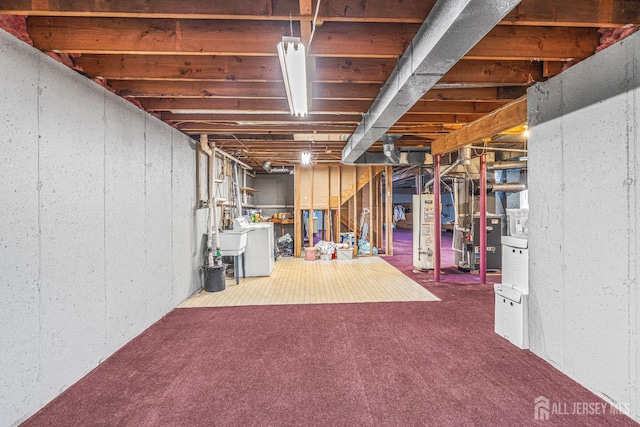 5 Fairway Blvd Unit 5, Monroe, NJ 08831 - unfinished below grade area featuring water heater and carpet