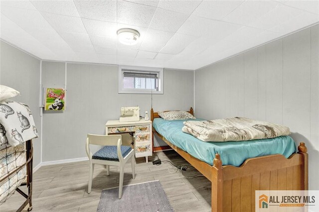 bedroom with light wood-style flooring