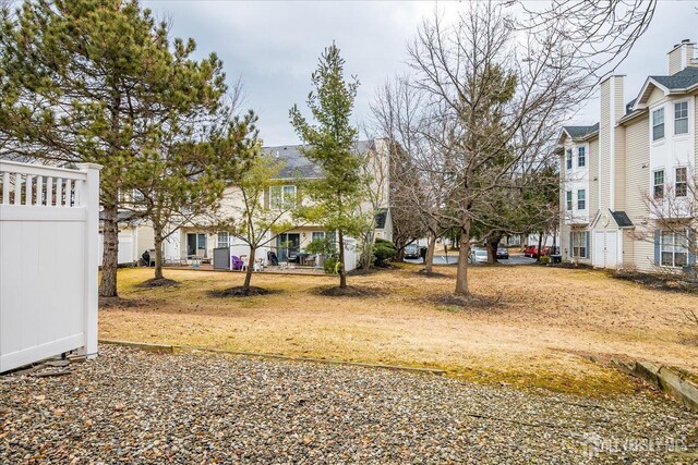 view of yard featuring a residential view