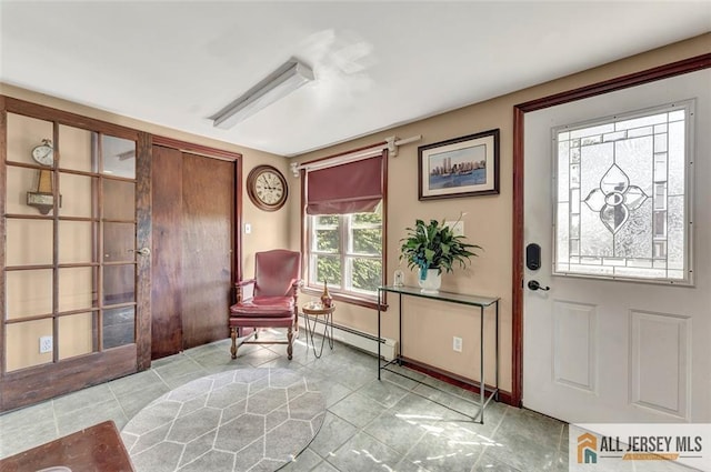 71 Russell St, Woodbridge Proper, NJ 07095 - foyer entrance with a baseboard heating unit