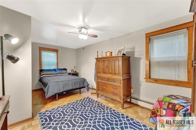 71 Russell St, Woodbridge Proper, NJ 07095 - bedroom featuring a baseboard radiator, ceiling fan, and baseboards